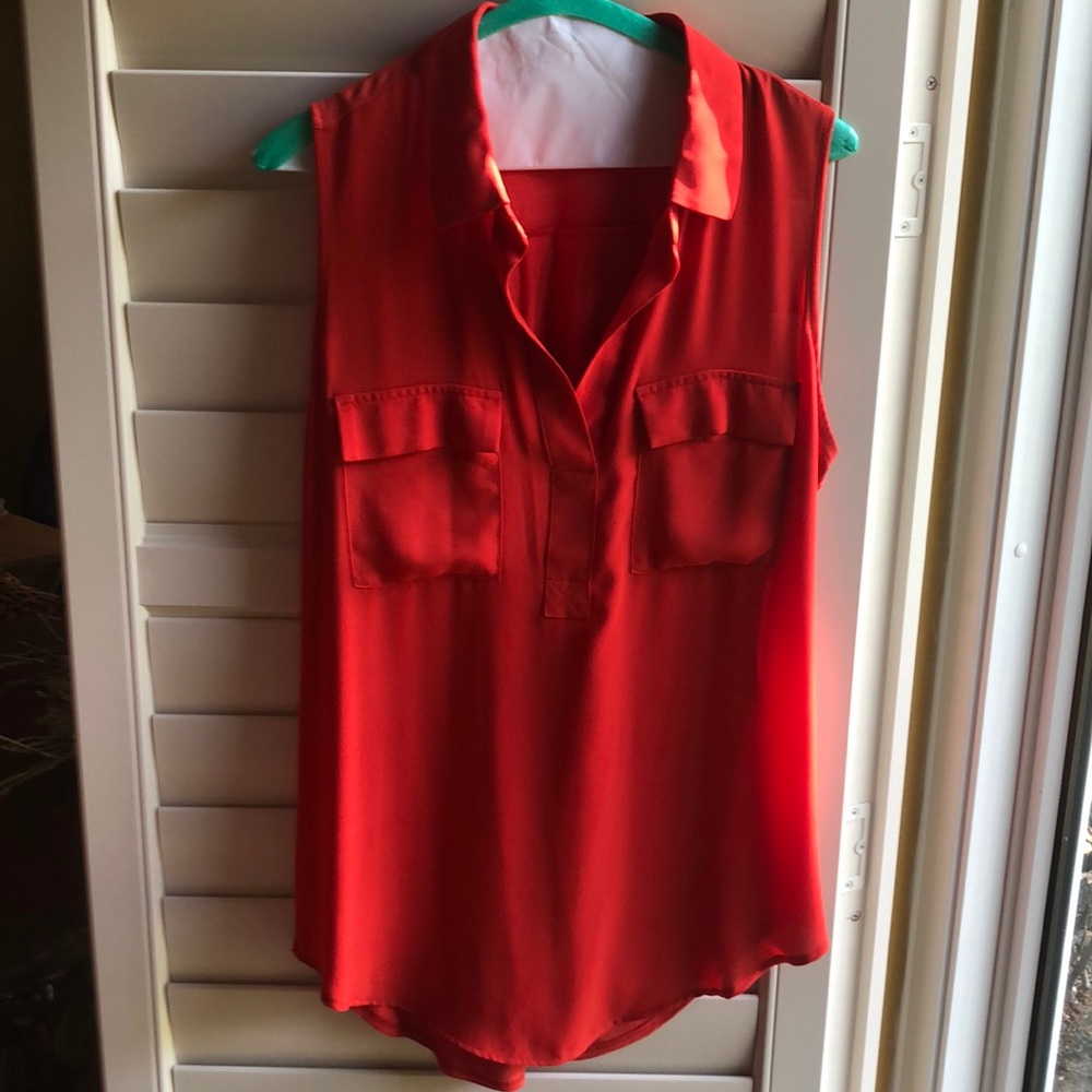 Orangey red silk looking polyester blouse with soft knot back.